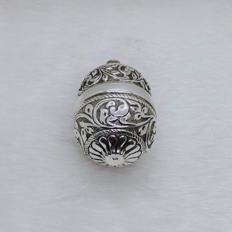 Real silver nariyal in antique carvings for pujan and by puran
