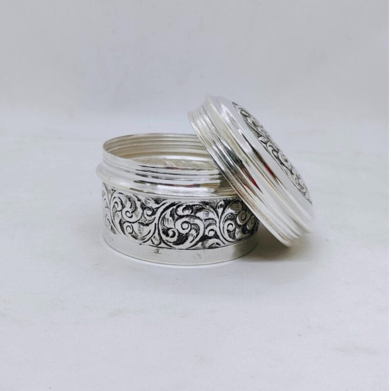 Hallmarked silver box for gifting in antique rounded shape carving